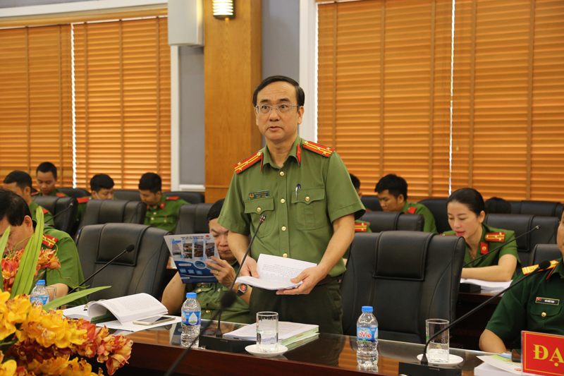Thượng tá Nguyễn Quang Thắng - Phó Cục trưởng Cục V04, Bộ Công an tham luận tại Hội thảo